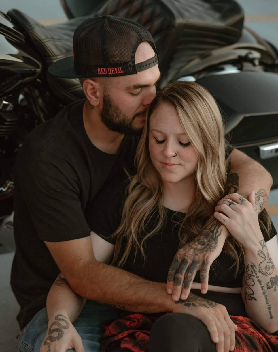 Couple with tattoos at Rebel Roots Tattoo studio