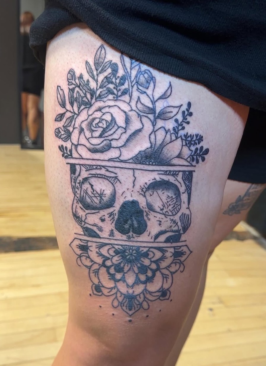 Skull flower leg abstract tattoo