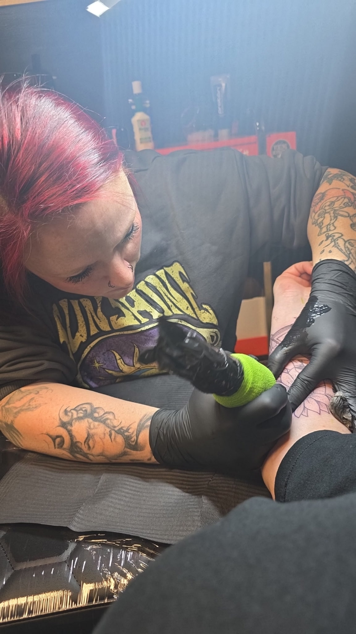 Hilary Siekman tattooing at Rebel Roots Tattoo, Logan Iowa